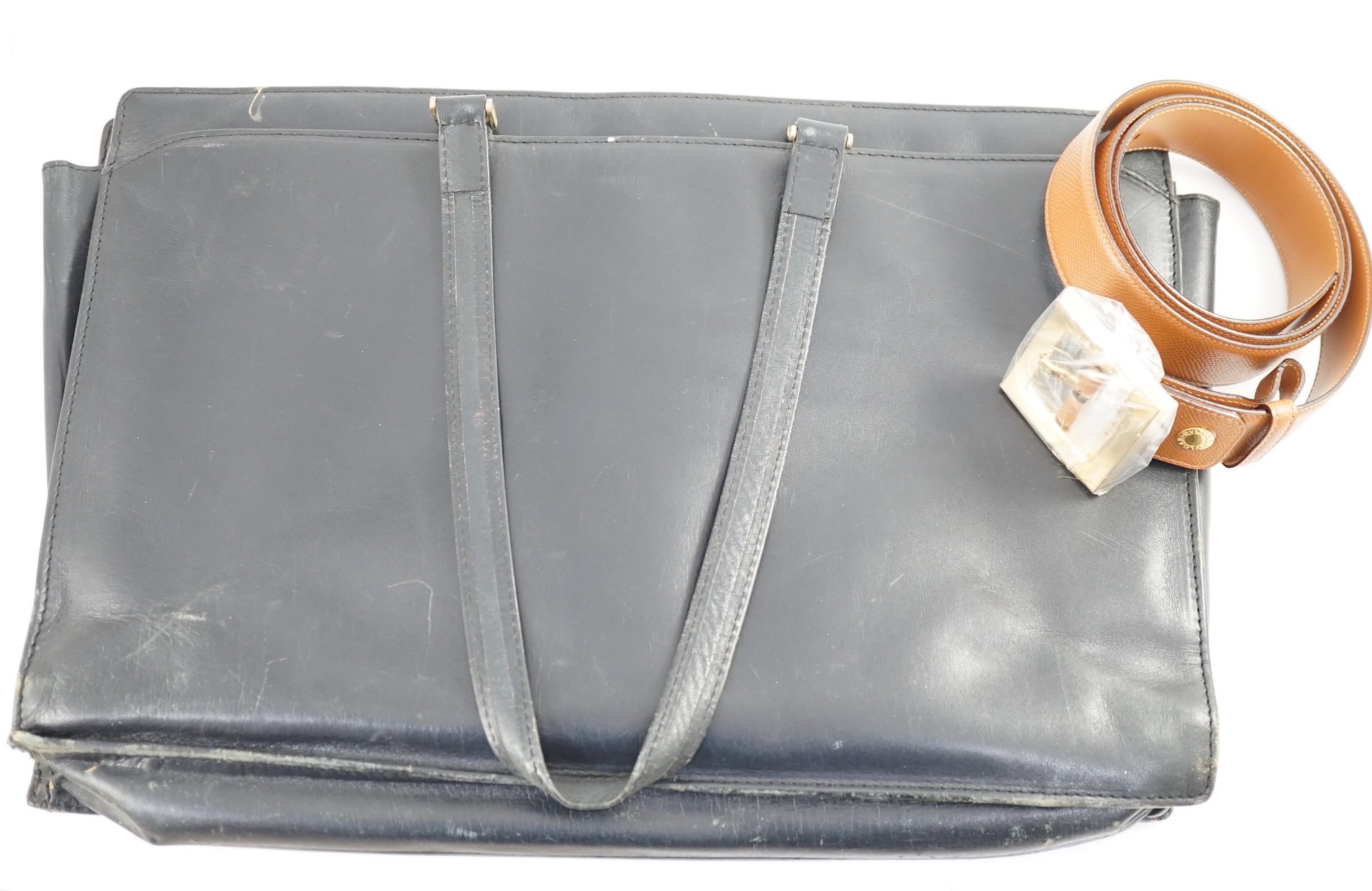 A Bulgari tan leather belt (unused), 115 cm, boxed with bag and a worn Asprey black leather attaché case